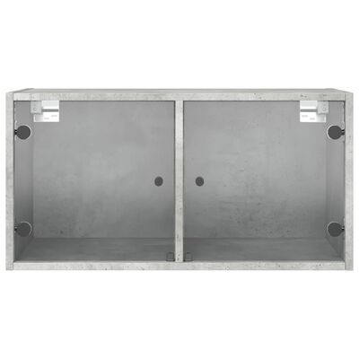 vidaXL Stranska omarica s steklenimi vrati betonsko siva 68,5x37x35 cm