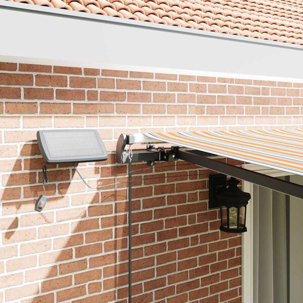 vidaXL Retraktilna tenda z LED lučmi večbarvno 450 &times;300 cm blago