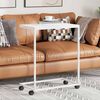 vidaXL Stranska mizica s kolesi bela 55x35x70 cm konstruiran les