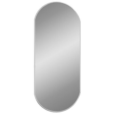 vidaXL Stensko ogledalo srebrno 70x30 cm ovalno