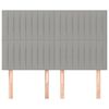 vidaXL Vzglavje za posteljo svetlo sivo 144x5x118/128 cm blago