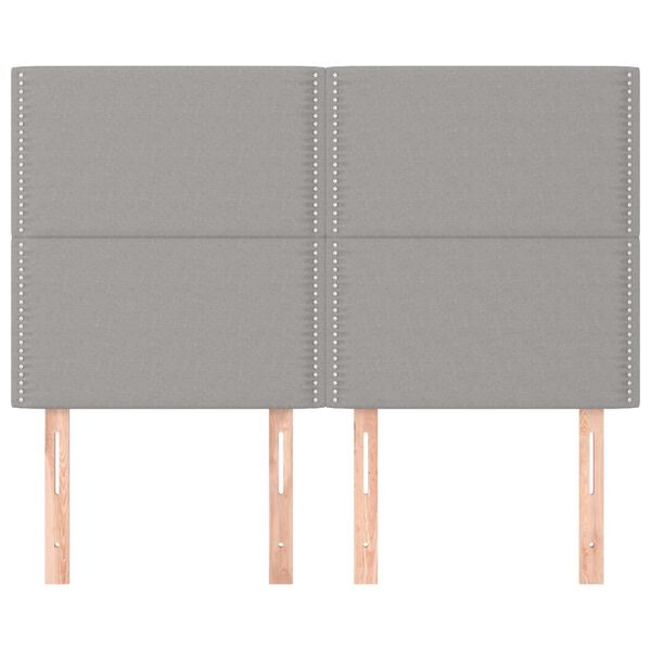 vidaXL Vzglavje za posteljo svetlo sivo 144x5x118/128 cm blago