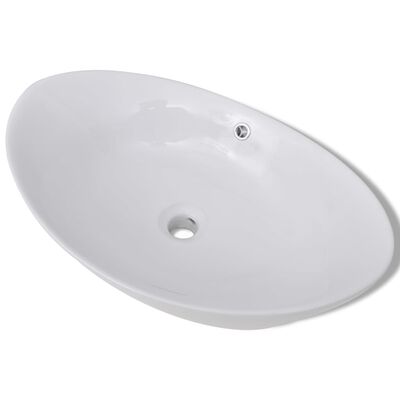 Keramični ovalni umivalnik z izlivnim sist. dimenzije 59 x 38,5 cm