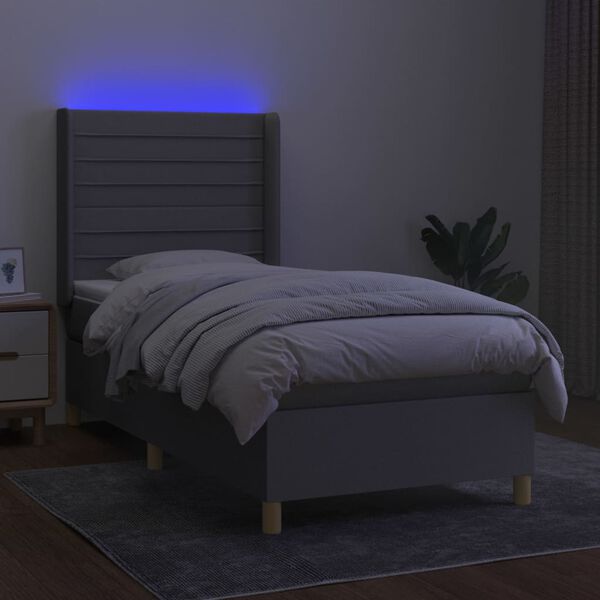 vidaXL Box spring postelja z vzmetnico LED svetlo siva 90x200 cm blago