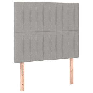 vidaXL Vzglavje za posteljo svetlo sivo 80x5x118/128 cm blago