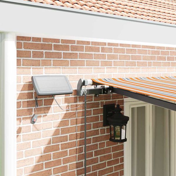 vidaXL Retraktilna tenda z LED lučmi večbarvno 600 &times; 300 cm blago