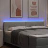 vidaXL LED glava postelje z LED lučmi Svetlo siva 180 cm Poliester