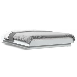 vidaXL Posteljni okvir z LED lučkami bel 140x190 cm inženirski les