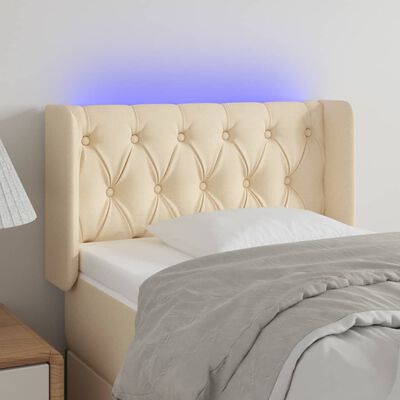 vidaXL LED posteljno vzglavje krem 83x16x78/88 cm blago