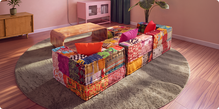 Barvita modularna sedežna garnitura patchwork, postavljena okoli lesene klubske mizice na okrogli preprogi v sodobni dnevni sobi.