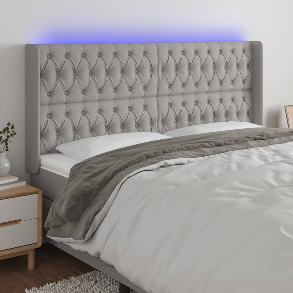 vidaXL LED posteljno vzglavje svetlo sivo 203x16x118/128 cm blago