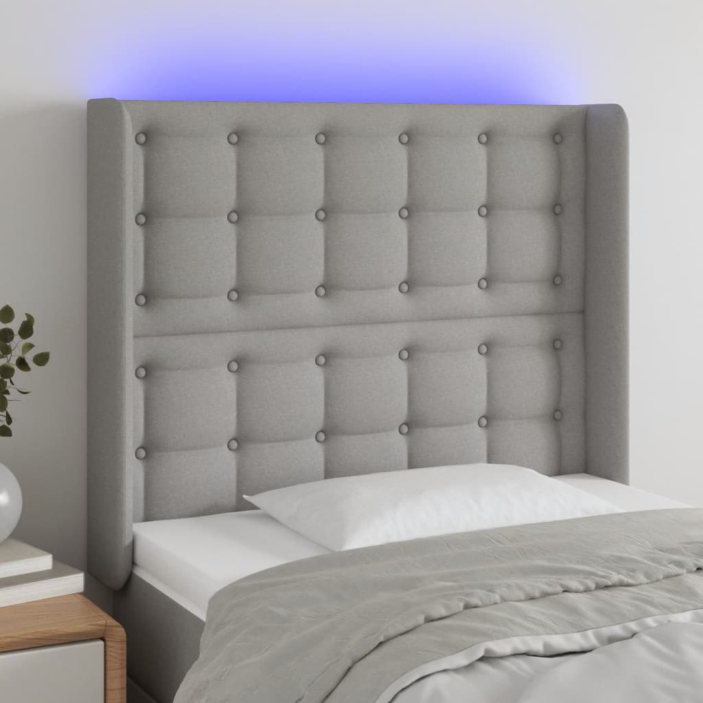 vidaXL LED posteljno vzglavje svetlo sivo 83x16x118/128 cm blago