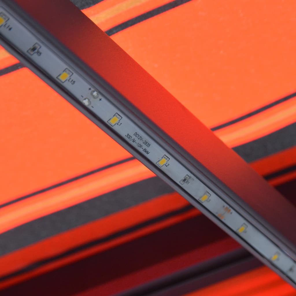 vidaXL Ročno zložljiva tenda LED 450x300 cm oranžna in rjava