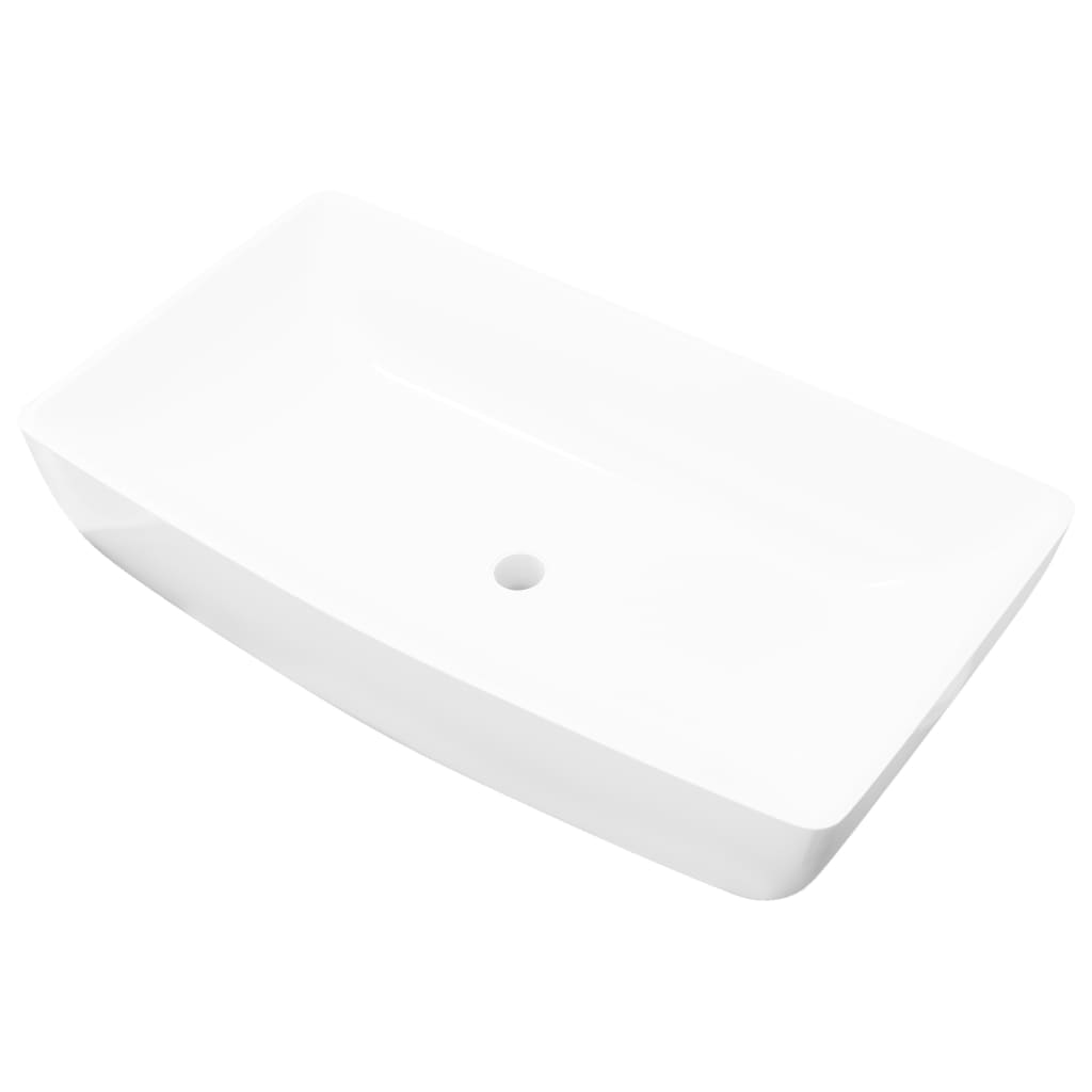 Pravokotni umivalnik bele barve dimenzije 71 x 39 cm