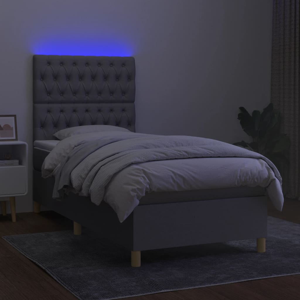 vidaXL Box spring postelja z vzmetnico LED svetlo siva 90x200 cm blago