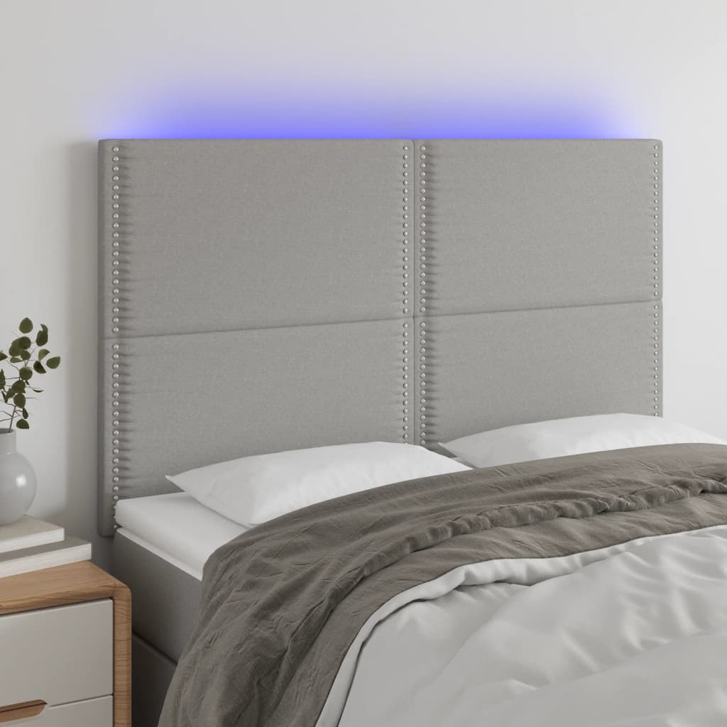 vidaXL LED posteljno vzglavje svetlo sivo 144x5x118/128 cm blago